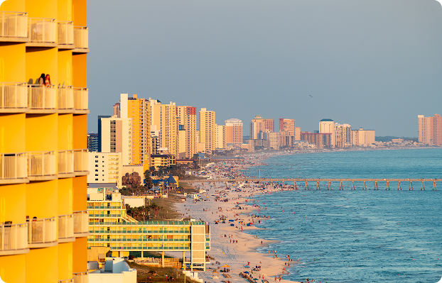 Coastal cityscape with beach and buildings